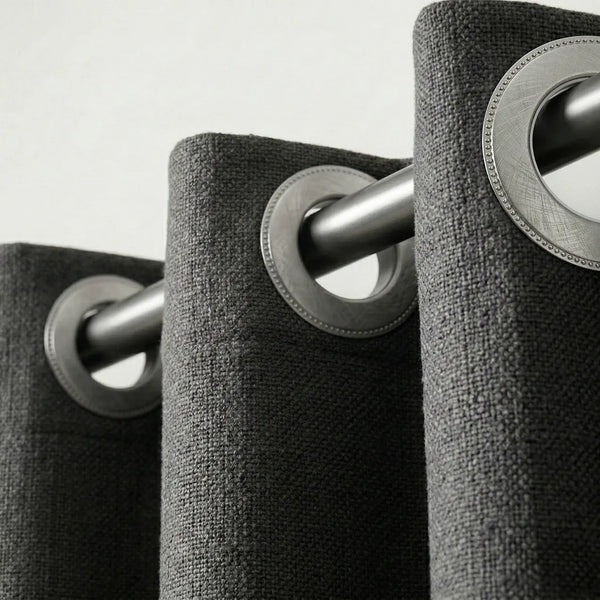 Rideau sur mesure à œillets chromés en tissu gris anthracite Kurtens, fixation sur tringle métallique design