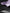Vue artistique des trois couches d'un rideau sur mesure Kurtens : face décorative lilas, âme occultante noire et dos matelassé phonique thermique, isolation acoustique performante